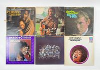 Six records laid out showing Lightfoot, Chick Corea, Sarah Vaughan and Porgy and Bess