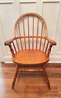 Front view of maple Windsor fan back armchair