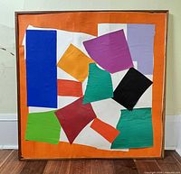 Front view of framed collage showing full artwork and frame