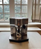 Full frontal view of DeLonghi EC860 Dedica espresso machine