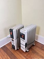 Both DeLonghi oil-filled radiator heaters side by side