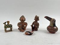 All five terracotta sculptures displayed together