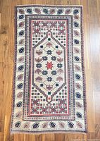 Full view of entire rug showing overall design and colors