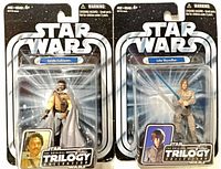 Both carded figures side by side