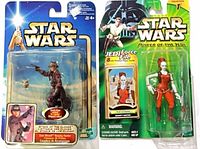 Front view of both sealed action figures in packaging