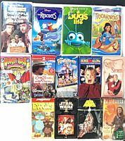 All 13 VHS tapes front covers in a grid