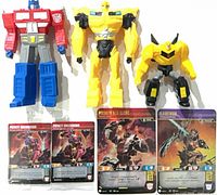 Front view of three figures and four cards