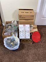 stacked boxes of jars, accessories visible