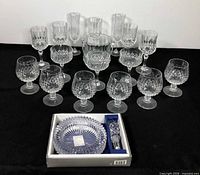 Full set of crystal stemware, ice bucket and boxed Mikasa set displayed