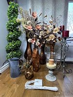 Wide view of entire décor lot including topiary, vases, candle holders and accessories