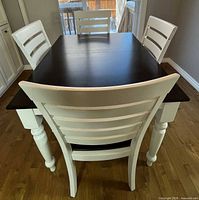 Front view of table with four chairs