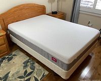 Full bed showing mattress, box spring, headboard, frame