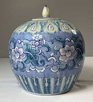 Front view of blue porcelain ginger jar with floral decoration