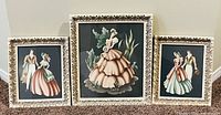 All three framed Turner prints upright on floor
