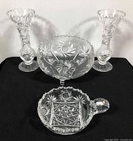 Group shot showing two vases, footed bowl, handled candy dish