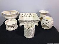 Group shot of all six cream porcelain lace items