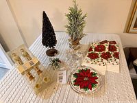 Assorted Christmas decorations displayed on table