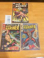 Front covers of all three Sub-Mariner comics #49, #2, #5 on table