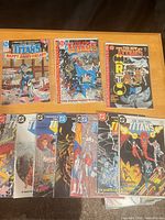 All eleven New Teen Titans issues laid out