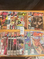 All 16 Namor comic issues spread on table in two rows, bagged and boarded