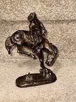 Close view of Franklin Mint Remington "The Outlaw" sculpture