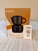 Retail box of AEVO milk frother & steamer with product image