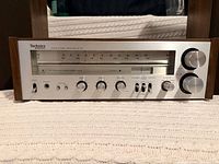 Front view of Technics SA-200 receiver, showing controls and tuning dial