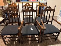 Front view showing six side chairs and two armchairs