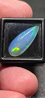 Overall view of opal cabochon showing play-of-color