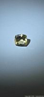 Front view of cushion cut golden yellow helidor