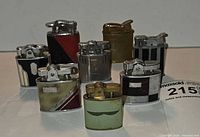 Group shot of eight assorted Art Deco pocket lighters