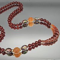 Full view of the carnelian and cloisonné beaded necklace