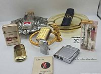 Group shot of all lighters, ashtrays, matchbooks