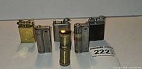 Front view of all six lighters standing upright