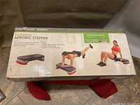 Box showing PurAthletics Aerobic Stepper branding and product image