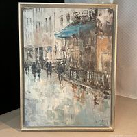 Full view of framed textured canvas print depicting European street scene
