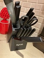 Front view of Syvio knife block with assorted knives and shears inserted