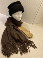 All three items displayed together on mannequin head