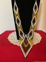 Full front view of necklace on display bust