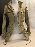 Full front view open showing interior drawstring and pockets