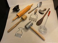 Group view of all ten vintage utensils laid out