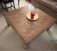 Top view showing entire square coffee table and herringbone pattern