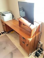 Overall view of credenza with raised monitor shelf and pedestal right side