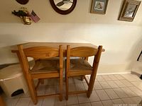 table with two chairs tucked underneath
