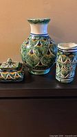 Vase, tumbler and lidded dish grouped together