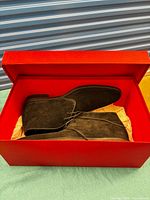 boots in red box with tissue paper