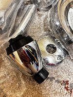 close-up of chrome shower head and escutcheon