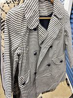 Striped double-breasted coat front view