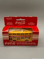 Bus in original Coca-Cola box front view