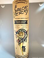 Front view of Sailor Jerry cardboard tube